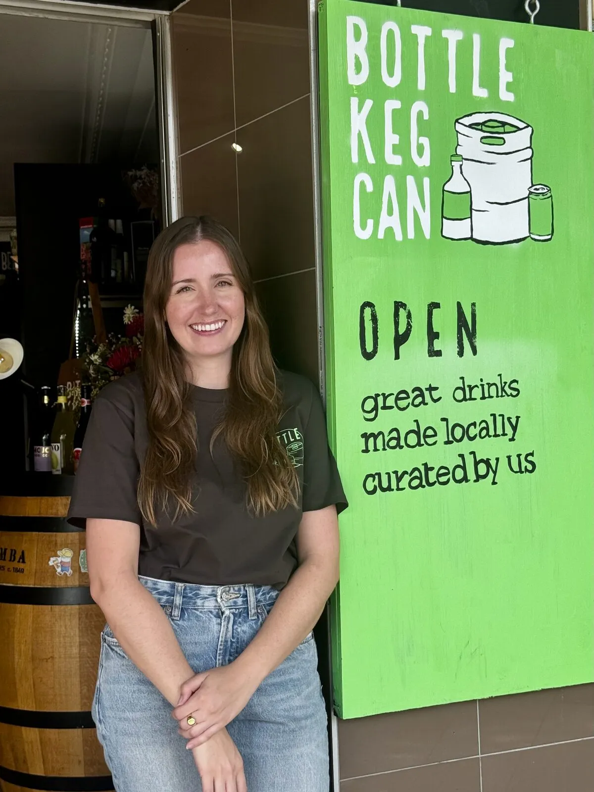 Kate at the shop door